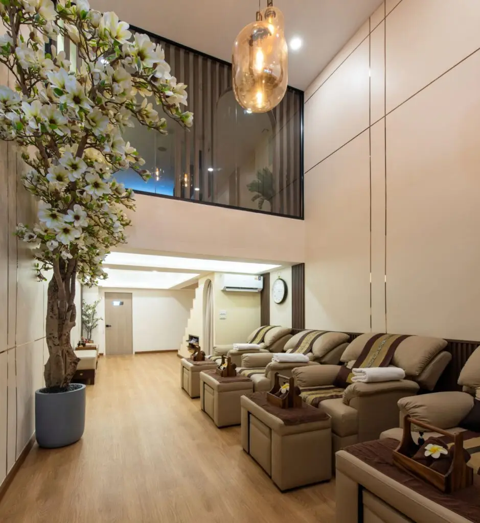 Spa lounge at Chandee Sleep Salon Bangkok with comfortable foot massage chairs